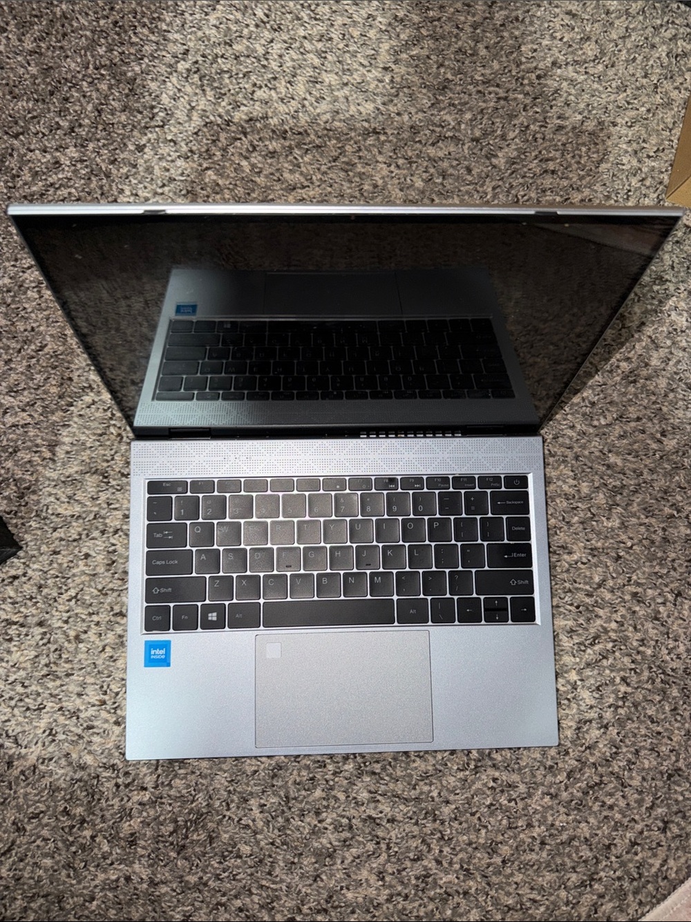 Silver Laptop with Intel Sticker - Sleek Portable Computer